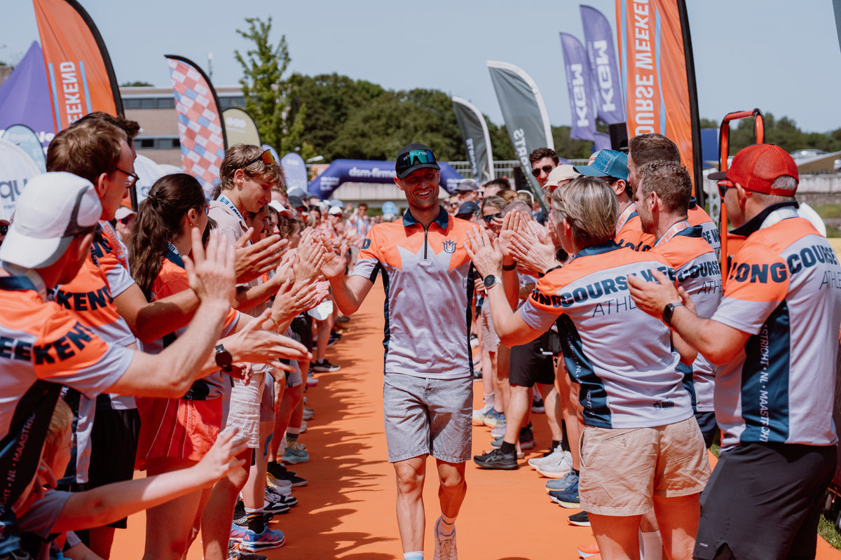 Polo half grijs oranje - NL 2026